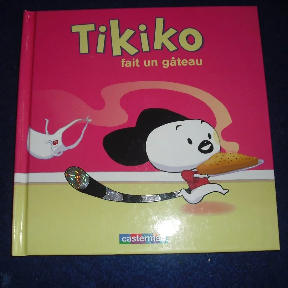 Tikiko fait un Gateau  Tikiko a la piscine  by Ange Andrianavalona 2007  New